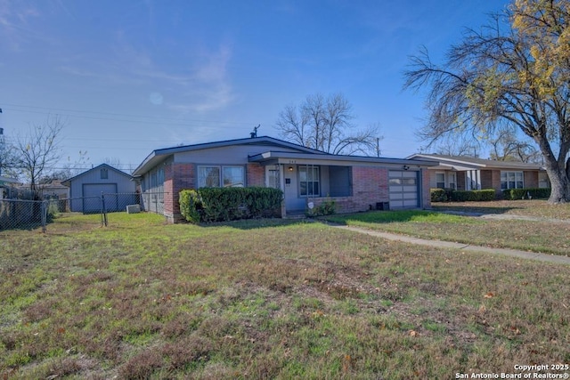 ranch-style house with a front yard and a garage