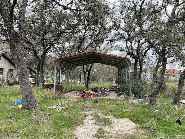 view of yard featuring a carport