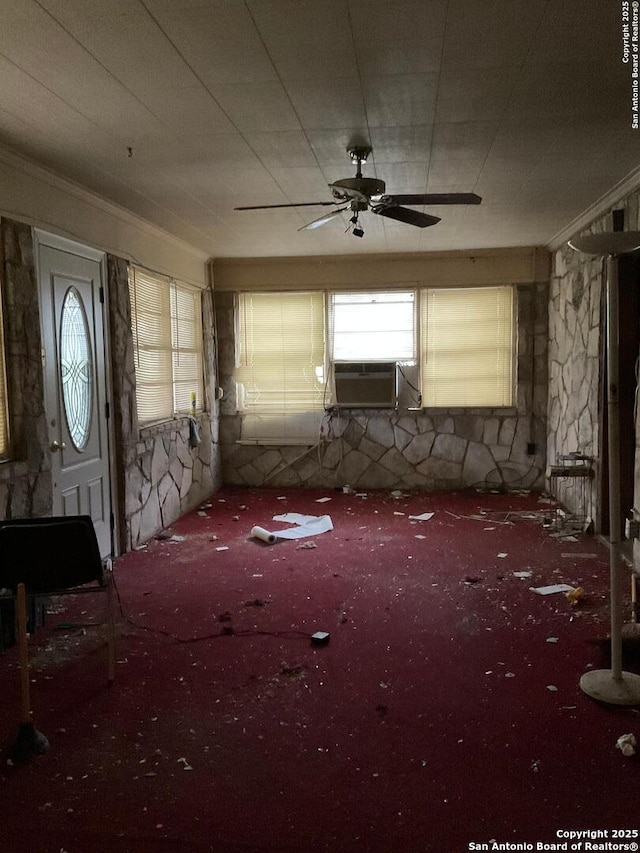 miscellaneous room with cooling unit, ceiling fan, carpet, and ornamental molding