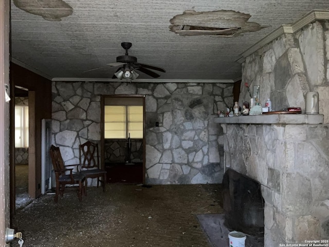 miscellaneous room with ceiling fan and ornamental molding