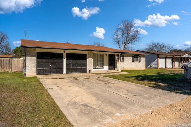 ranch-style house with a front lawn and a garage