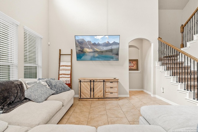 living room with light tile patterned floors