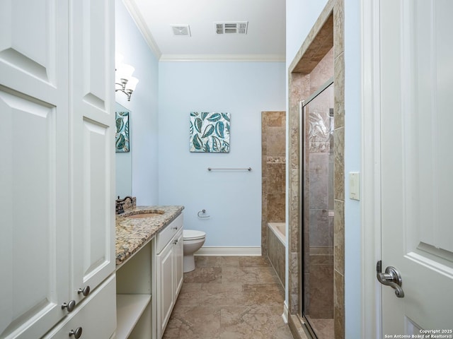 bathroom featuring vanity, toilet, a shower with door, and crown molding