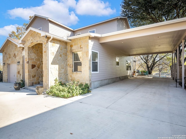 view of property exterior featuring a carport