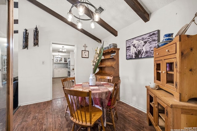 111 Austin Dr S, Boerne, TX 78006 - dining space with lofted ceiling with beams, visible vents, a chandelier, wood finished floors, and baseboards