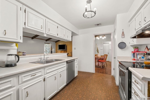 111 Austin Dr S, Boerne, TX 78006 - kitchen with visible vents, a sink, light countertops, under cabinet range hood, and stainless steel appliances