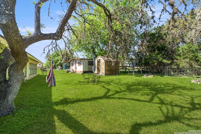 111 Austin Dr S, Boerne, TX 78006 - view of yard with a shed, fence, and an outdoor structure