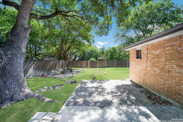 view of yard with a patio area