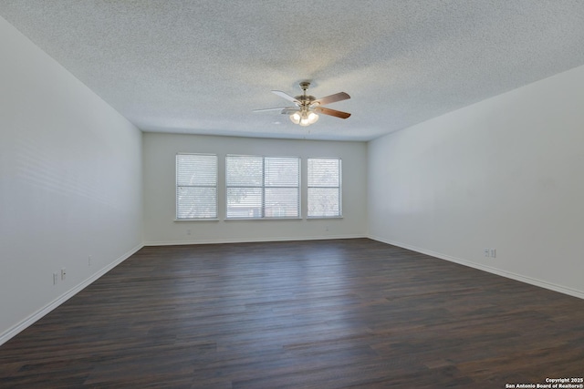 empty room with ceiling fan, a textured ceiling, and dark hardwood / wood-style flooring