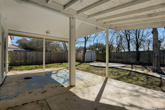 view of patio / terrace with a storage shed