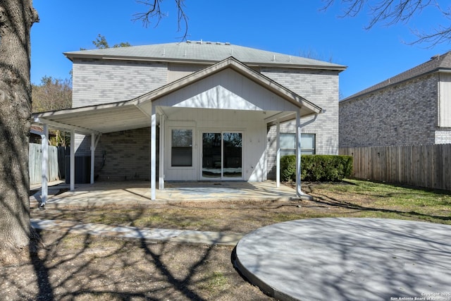 rear view of house with a patio area