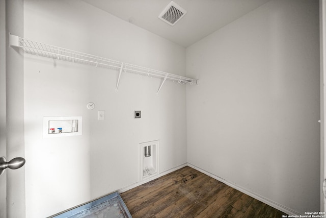 laundry area featuring dark hardwood / wood-style flooring, washer hookup, and hookup for an electric dryer