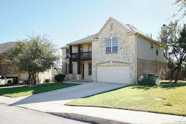 view of front of house with a balcony, a front yard, central AC unit, and a garage