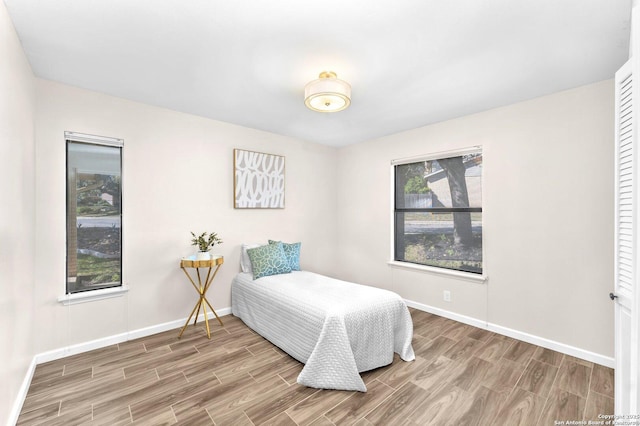 bedroom featuring hardwood / wood-style floors