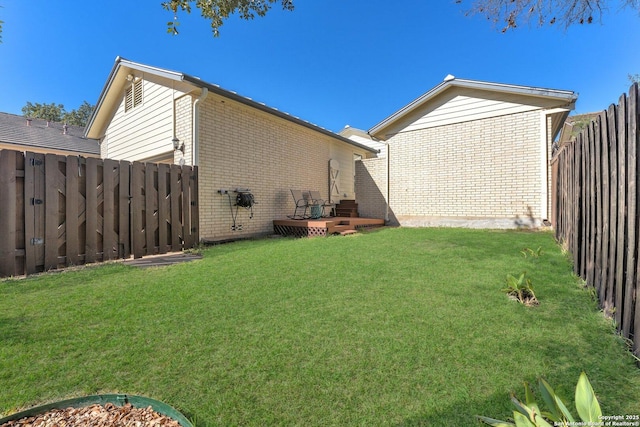 view of yard featuring a deck