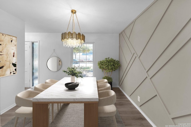 dining space with dark hardwood / wood-style flooring and a notable chandelier