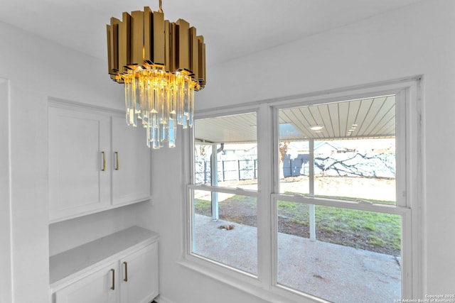 dining room with a notable chandelier