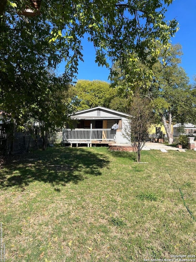 view of yard featuring a deck