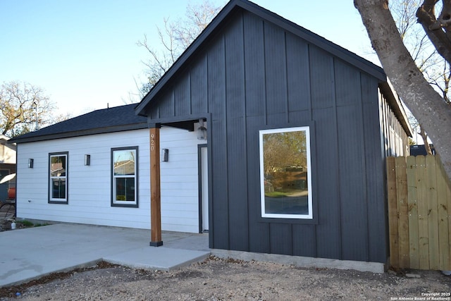 rear view of property featuring a patio area