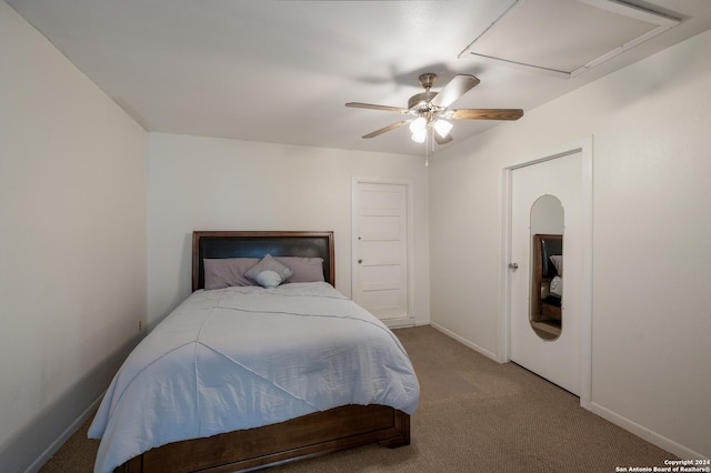 bedroom with ceiling fan and carpet floors