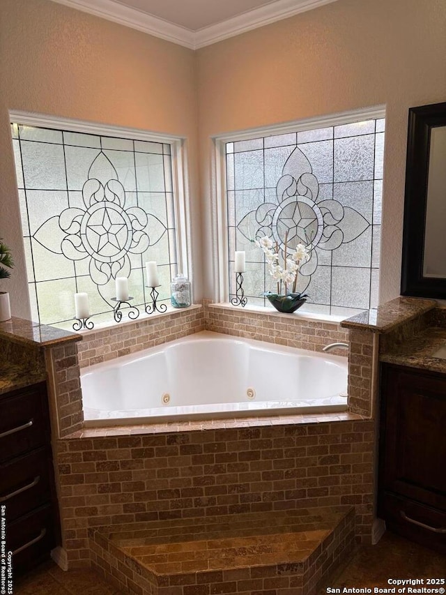 bathroom with vanity, a relaxing tiled tub, and ornamental molding