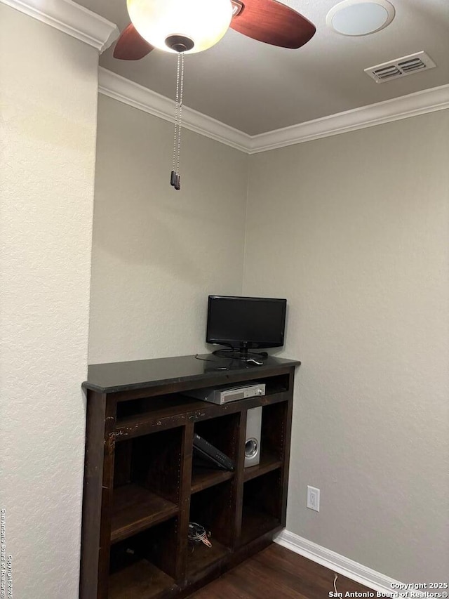 unfurnished office featuring dark hardwood / wood-style floors and ornamental molding