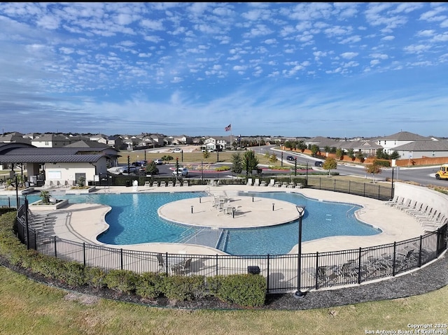 view of swimming pool with a patio area