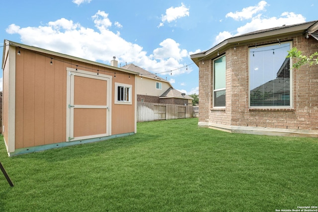 view of yard with a storage shed