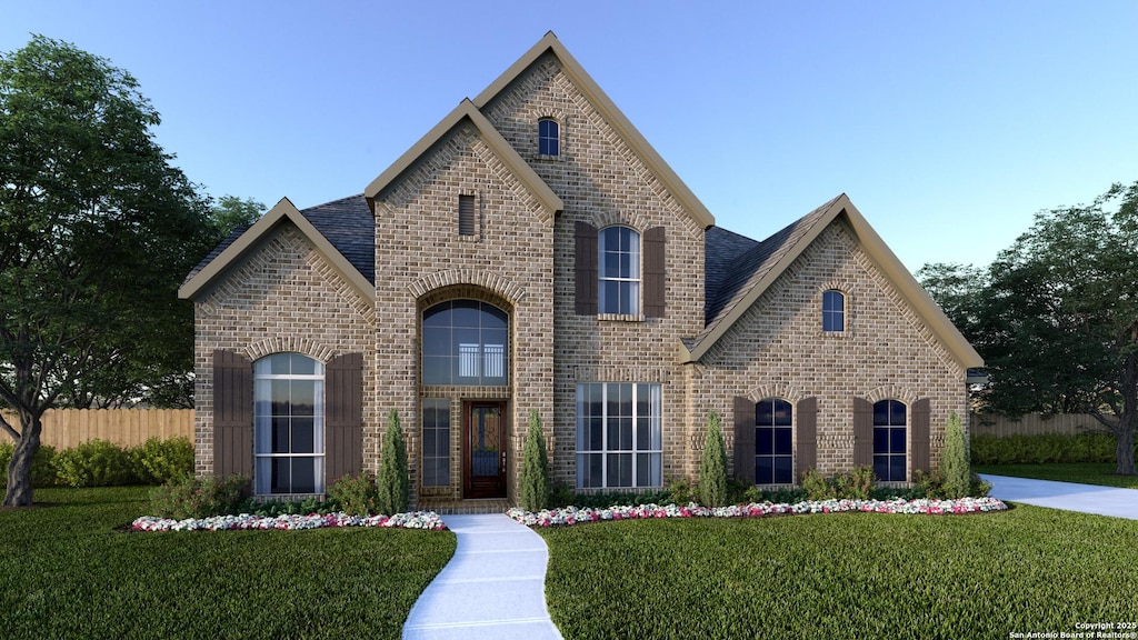 view of front of home featuring a front yard