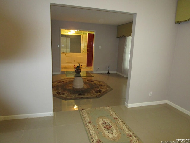 hall featuring tile patterned floors