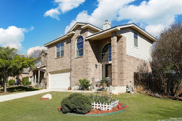 view of front of property with a garage and a front lawn