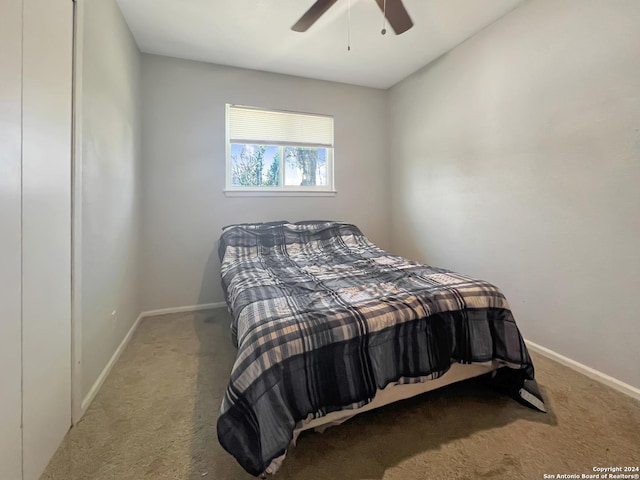 bedroom featuring carpet and ceiling fan