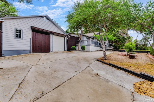 view of front of house featuring an outbuilding and a garage