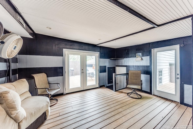 living area featuring light hardwood / wood-style floors and french doors