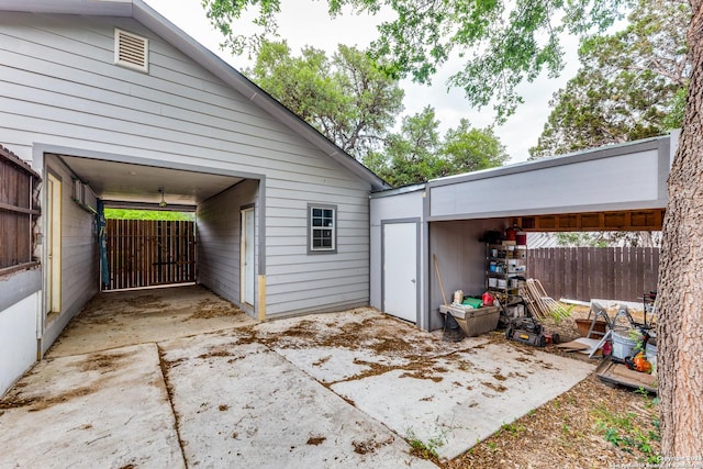 exterior space with a carport