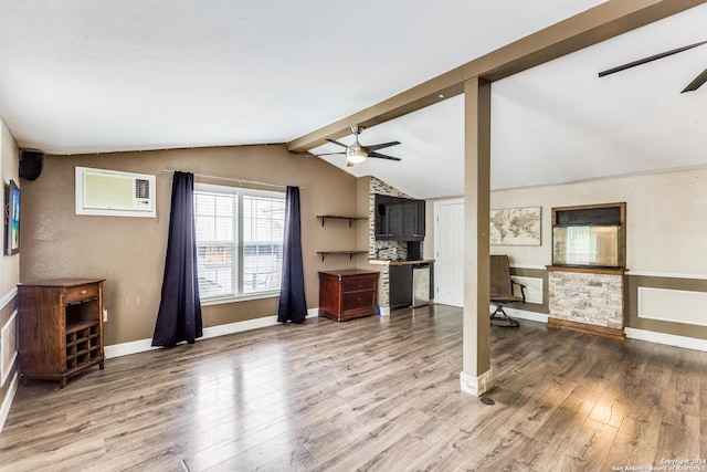 living room featuring an AC wall unit, vaulted ceiling with beams, ceiling fan, and hardwood / wood-style flooring