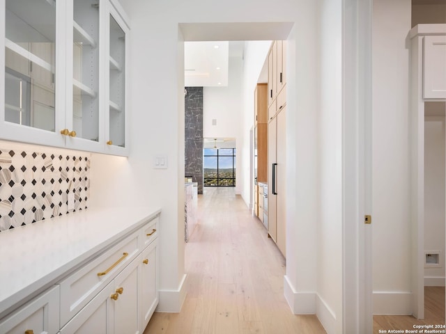 hallway featuring light wood-type flooring