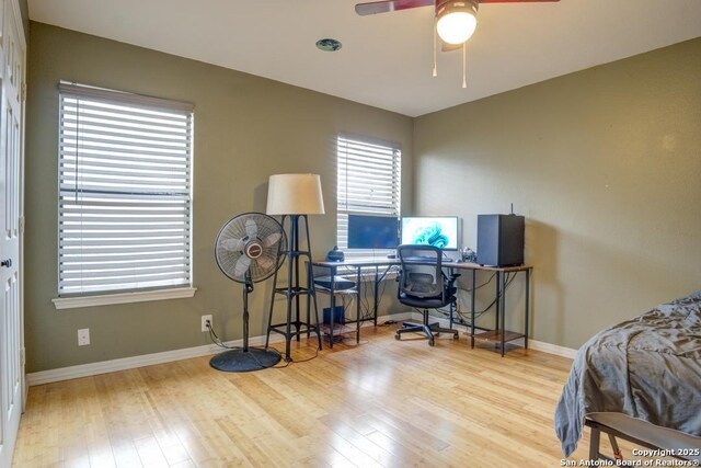 bedroom with light wood-type flooring