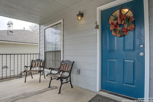 property entrance featuring covered porch