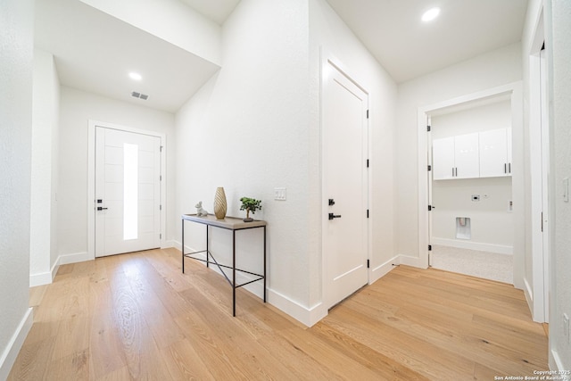 entrance foyer with light wood-type flooring