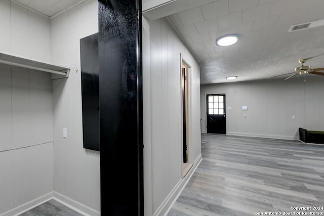 corridor featuring light hardwood / wood-style floors