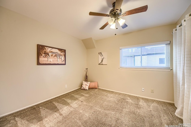 empty room featuring carpet flooring and ceiling fan