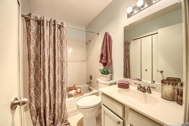 full bathroom with vanity, toilet, and shower / bath combo with shower curtain