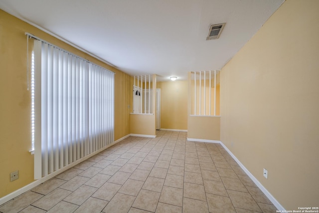 view of tiled spare room