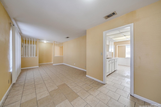 view of tiled spare room