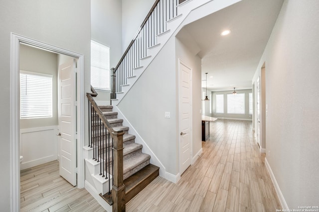 stairway with wood-type flooring