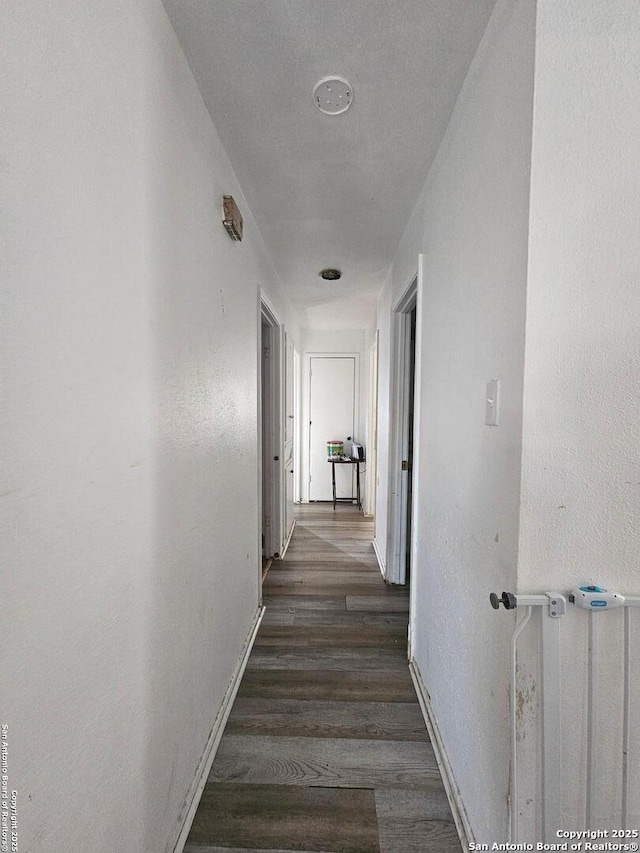 hall featuring dark hardwood / wood-style flooring