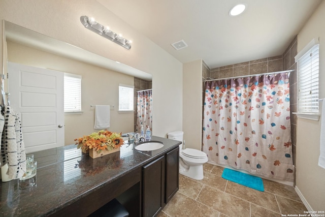 bathroom with a shower with curtain, vanity, and toilet