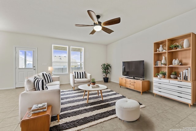 tiled living room featuring ceiling fan