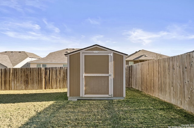 view of outdoor structure featuring a yard